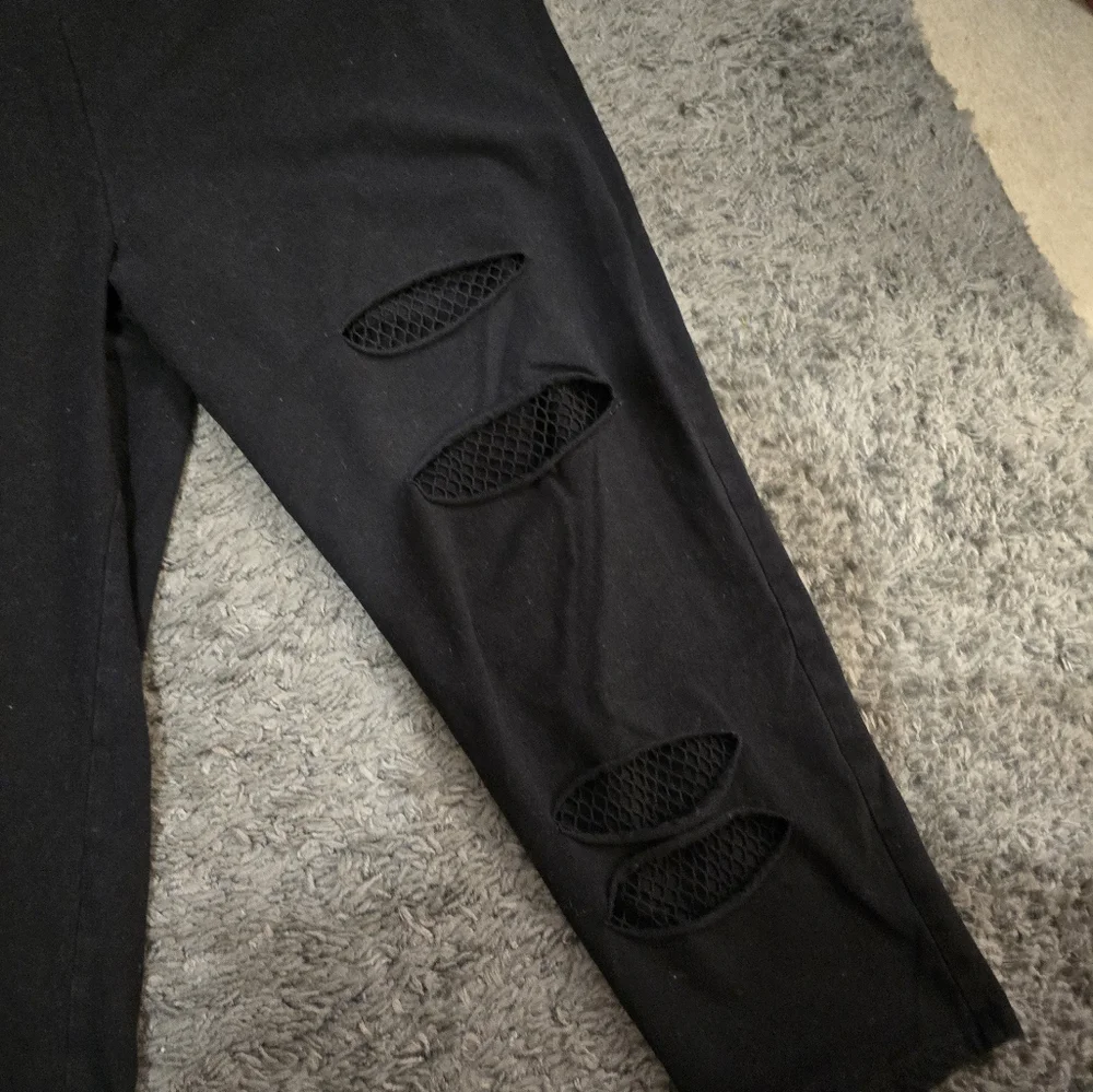 Torrid Black Ripped Leggings with Mesh Detail - Picture 4 of 7